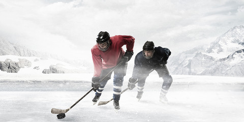 Hockey players on the ice . Mixed media