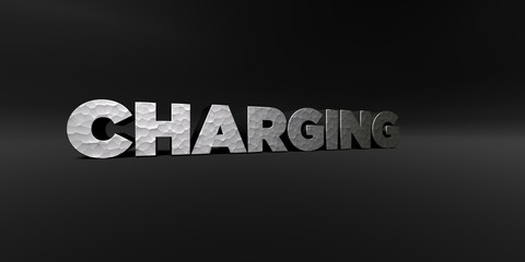 Obraz premium CHARGING - hammered metal finish text on black studio - 3D rendered royalty free stock photo. This image can be used for an online website banner ad or a print postcard.