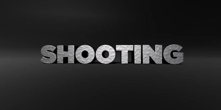 SHOOTING - hammered metal finish text on black studio - 3D rendered royalty free stock photo. This image can be used for an online website banner ad or a print postcard.