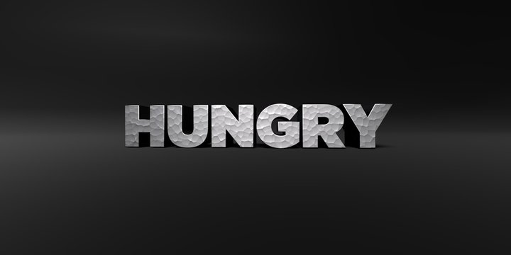 HUNGRY - hammered metal finish text on black studio - 3D rendered royalty free stock photo. This image can be used for an online website banner ad or a print postcard.