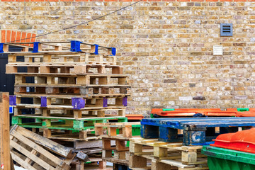 Pile of wooden pallets at a recycling yard