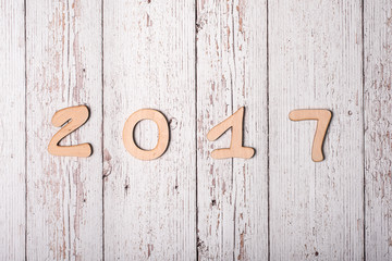 Wooden background with the word 2017