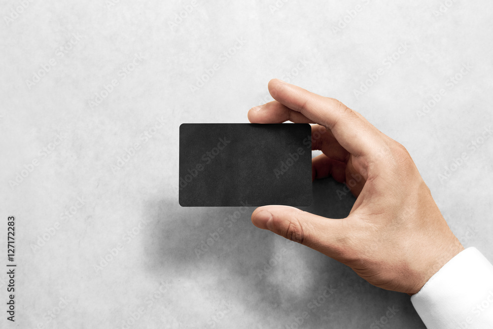Poster hand hold blank black craft card mockup with rounded corners. plain kraft call-card mock up template