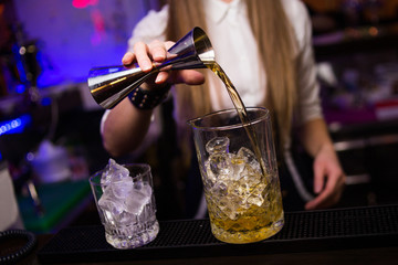 alcoholic cocktail is pours