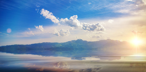 Amazing landscape with mountains , lake and blue sky with clouds. Exploring Armenia