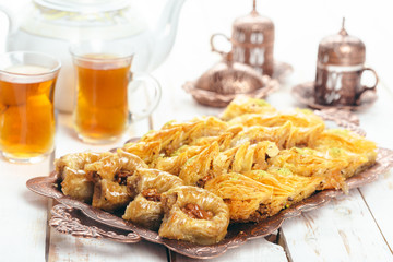  traditional eastern desserts on wooden background