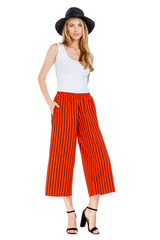 Fashion photo of young magnificent woman wearing fashionable summer clothes