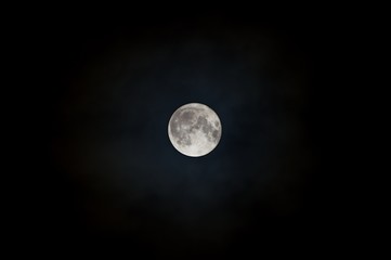 Full phase of supermoon photograph at 14th of November 2016 in England. With mild clouds.