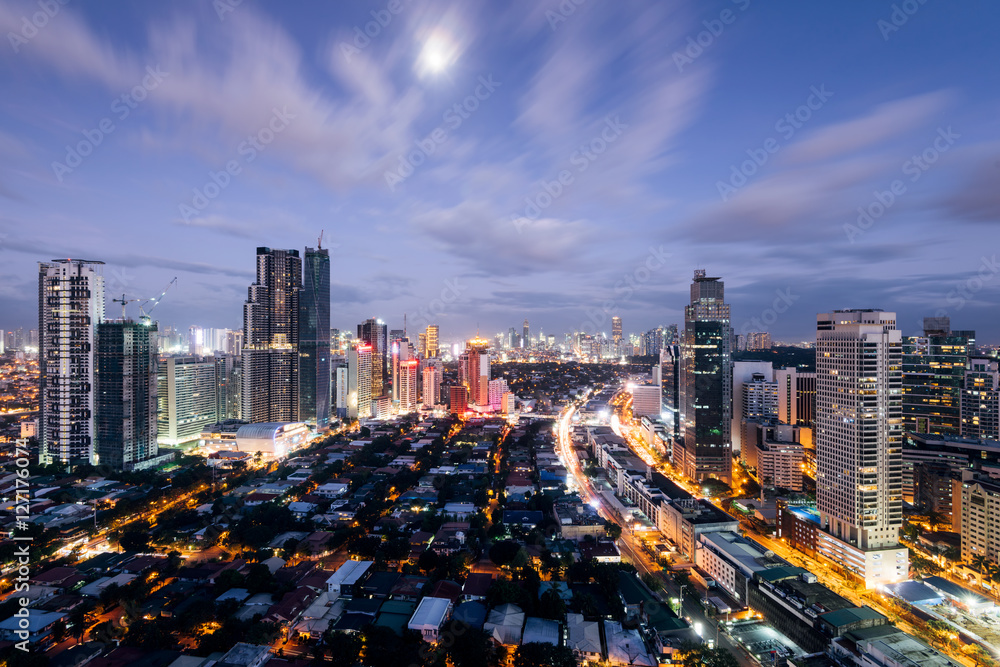 Wall mural Makati Skyline at night, Philippines. Makati is a city in the Philippines` Metro Manila region and the country`s financial hub. 