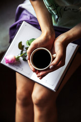 Fototapeta na wymiar Girl reading book and drinking coffee, beautiful rose. Morning,