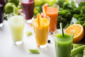 glasses with different fruit or vegetable juices