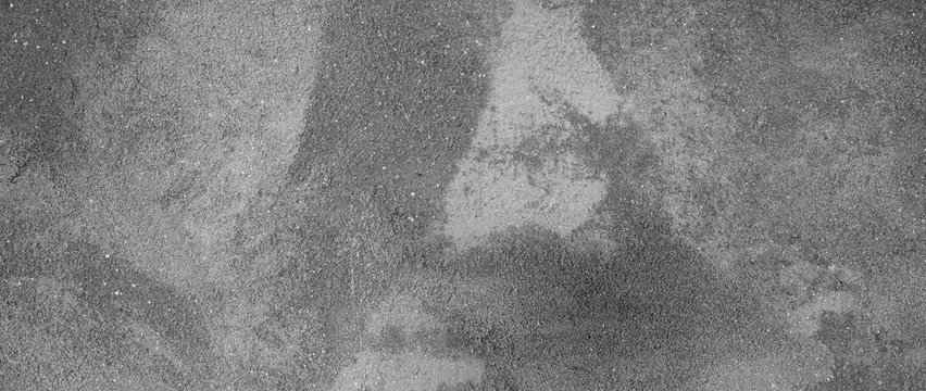 Asphalt, wet concrete wall texture.