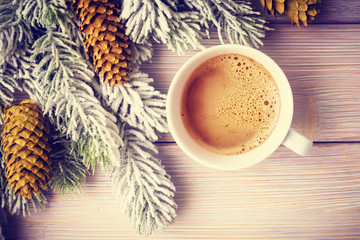 Obraz na płótnie Canvas Christmas background with fir tree and coffee cup