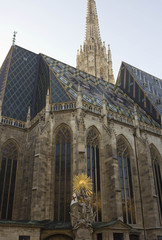 Architectural detail of St. Stephen's Cathedral facade with Capistran Chancel sculpture in Vienna, Austria