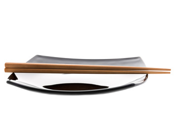 empty sushi set, plateaus and chopsticks isolated on white background