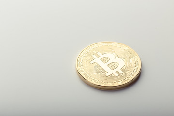 Golden Bitcoin coin isolated on white