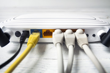 Network cables connected to router., close-up