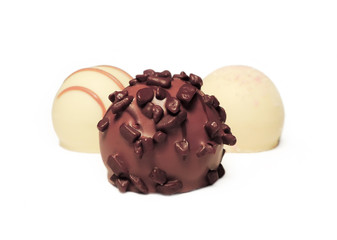 Chocolate truffles, chocolates isolated on white background.