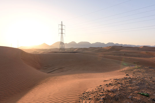 Electric Power Grid in Sand Desert, in Sharjah, United Arab Emirates,