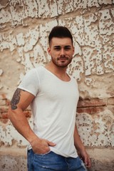 Fototapeta premium Strong guy with muscled arms