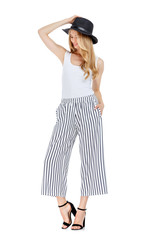 Fashion photo of young magnificent woman wearing fashionable summer clothes