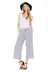 Fashion photo of young magnificent woman wearing fashionable summer clothes