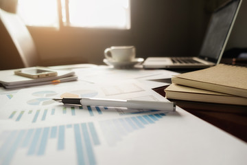 Office desk table with pen focus background. Vintage tone Retro filter effect,soft focus,low...