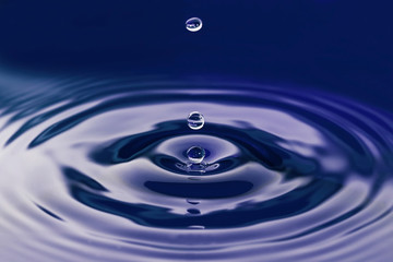 Three dark blue water drops abstract in dark blue hues.