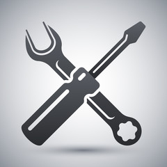 Simple vector icon of a screwdriver and a wrench on a light gray background. Hand tools for repair and construction
