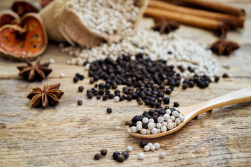 Spices and herbs for cooking background. Group of spices on wooden background and selective focus.