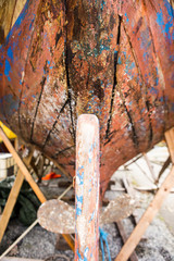 old rusty ship propeller, repair of old fishing boat