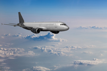 Fototapeta na wymiar airplane above field of white clouds