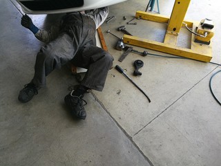 Mechanical repairs cars lying