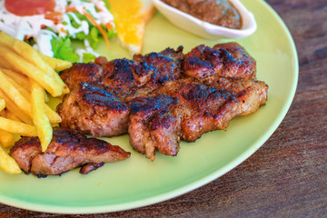 Top view the food steak , Rustic grilled beefsteak with french fries, Grilled beef steak