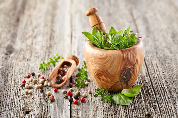 Herbs and spices on a wooden board