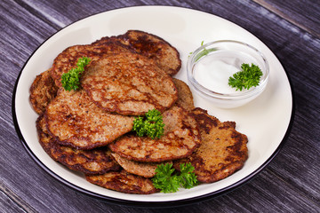 Liver Patties with Sour Cream and Parsley. Liver Cakes or Fritters of Liver. Healthy snack or take-away lunch bites