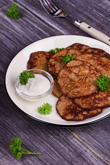 Liver Patties with Sour Cream and Parsley. Liver Cakes or Fritters of Liver. Healthy snack or take-away lunch bites