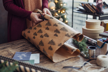 Naklejka na ściany i meble Woman Wrapping Christmas Presents