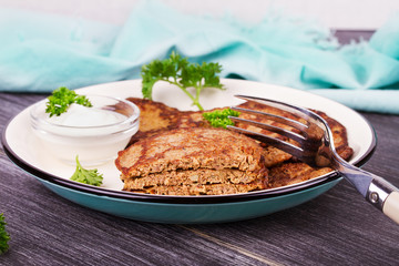 Liver Patties with Sour Cream and Parsley. Liver Cakes or Fritters of Liver. Healthy snack or take-away lunch bites
