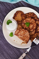 Liver Patties with Sour Cream and Parsley. Liver Cakes or Fritters of Liver. Healthy snack or take-away lunch bites