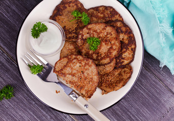 Liver Patties with Sour Cream and Parsley. Liver Cakes or Fritters of Liver. Healthy snack or take-away lunch bites
