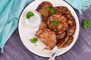 Liver Patties with Sour Cream and Parsley. Liver Cakes or Fritters of Liver. Healthy snack or take-away lunch bites