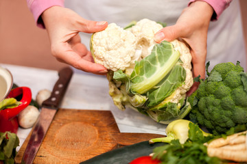Woman holding cauliflower