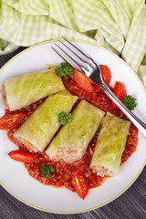 Cabbage rolls with meat, rice and vegetables in tomato sauce. Stuffed cabbage leaves with meat. Dolma, sarma, sarmale, golubtsy or golabki - traditional dish in many countries