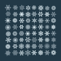 Collection of white christmas snowflakes in different shape on b