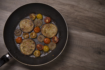 Fried vegetables on frying pan