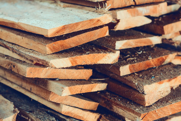 Large stack of wood planks