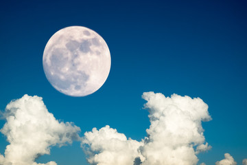 Naklejka na ściany i meble super full moon in 68 years with clear blue sky cloud daytime for background backdrop use