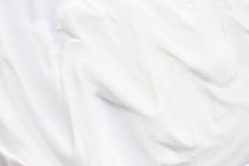 Obraz na płótnie Canvas Cosmetics. Cream white background texture.