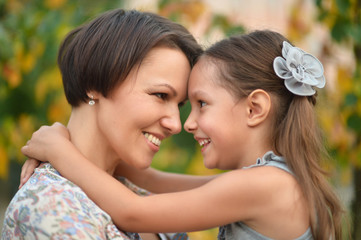 Portrait of mother and daughter